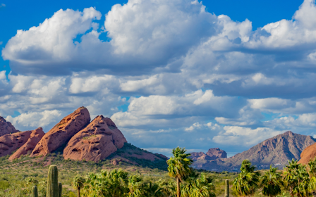 A landscape with mountains and trees.
