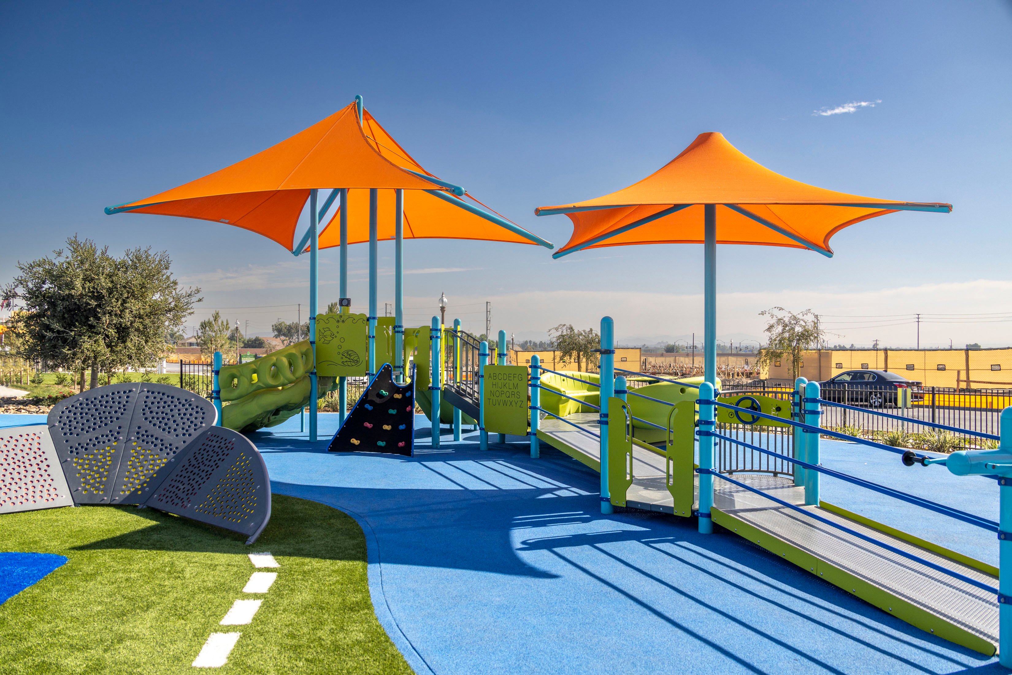 A swimming pool with umbrellas.