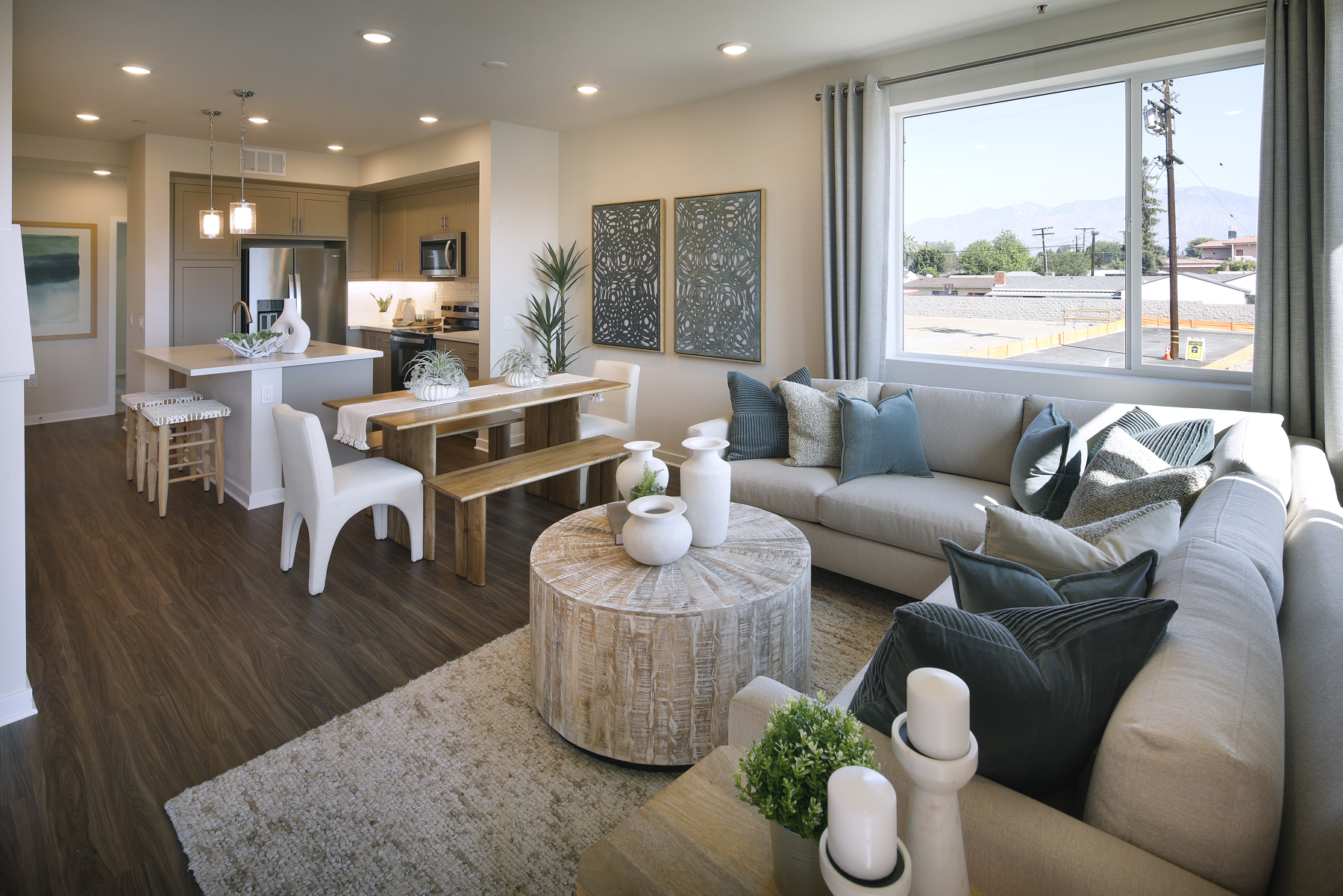 A living room with a large window.