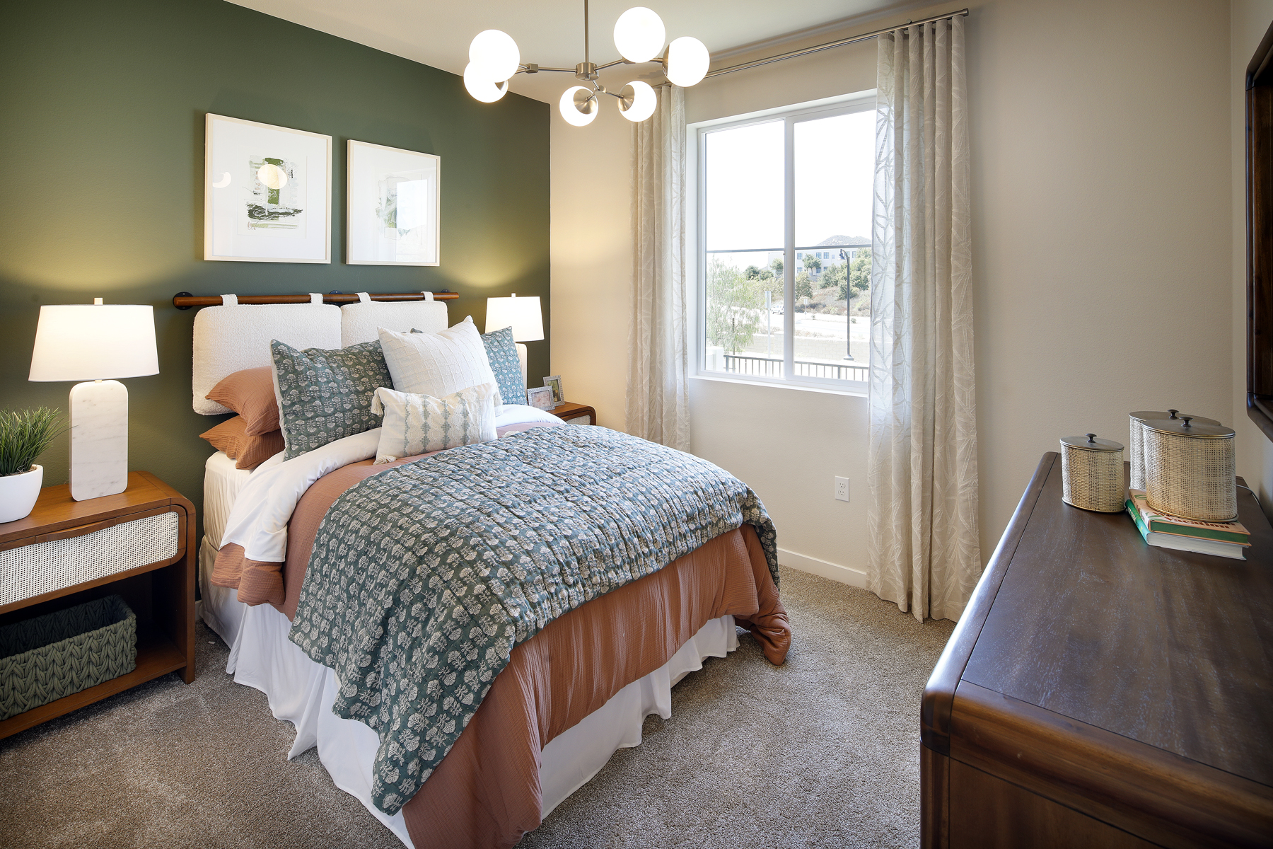 A bedroom with two beds.