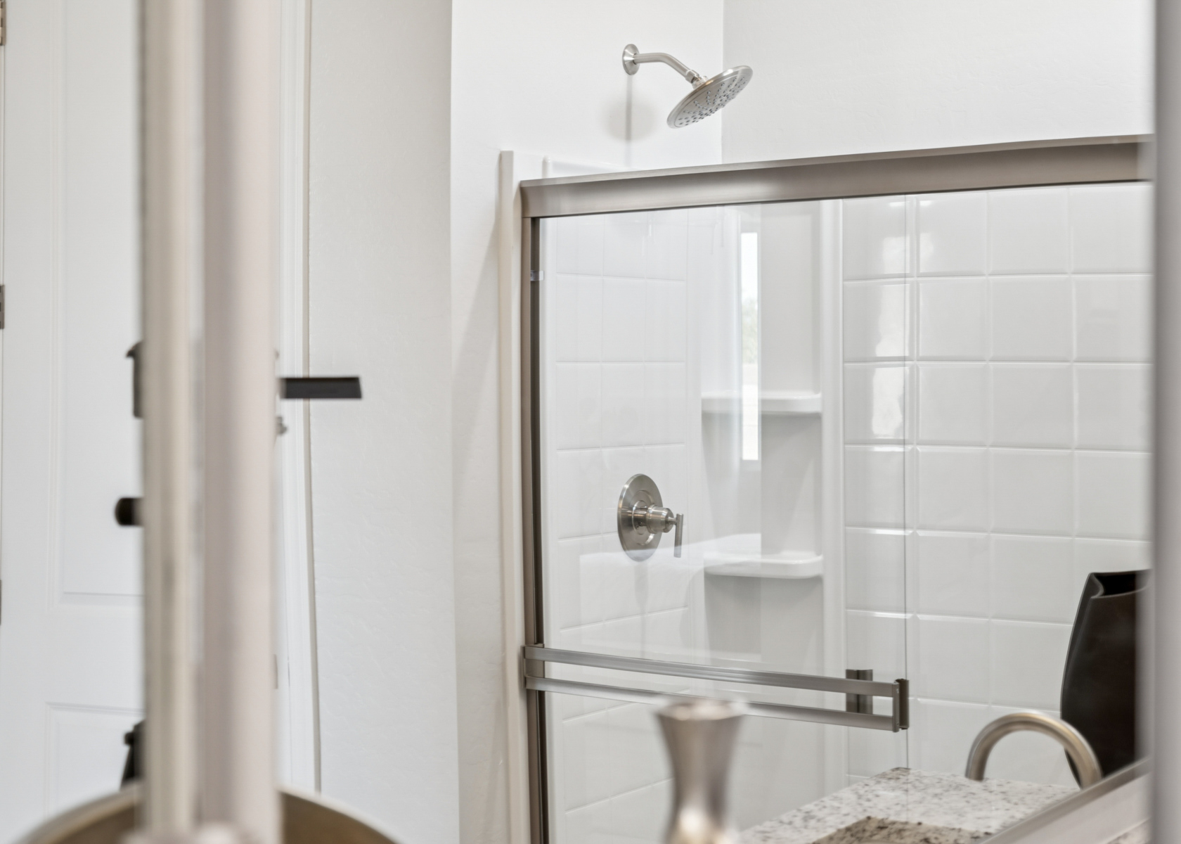 A shower unit in a bathroom.