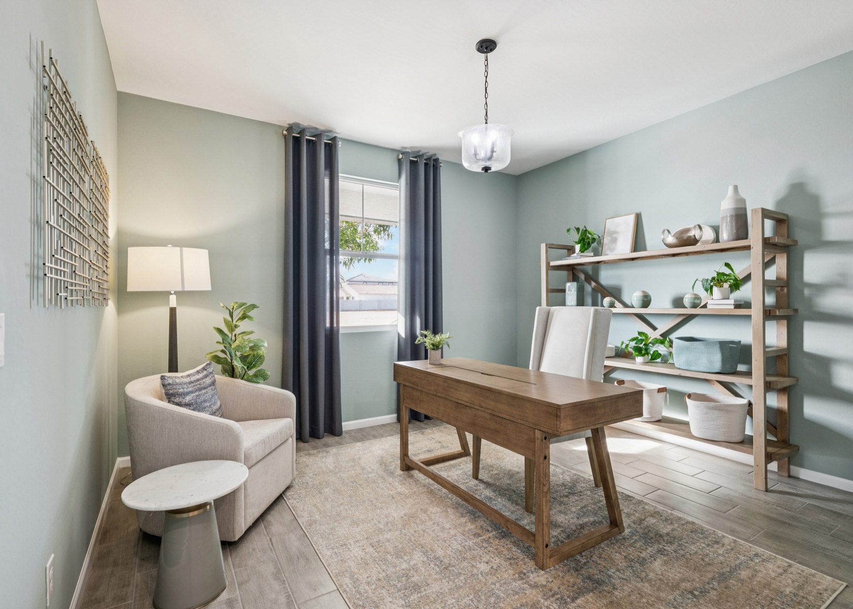 A room with a table and chairs.