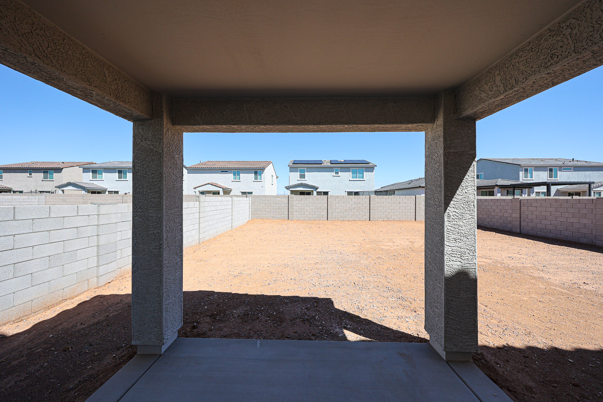 A concrete structure with a fence around it.