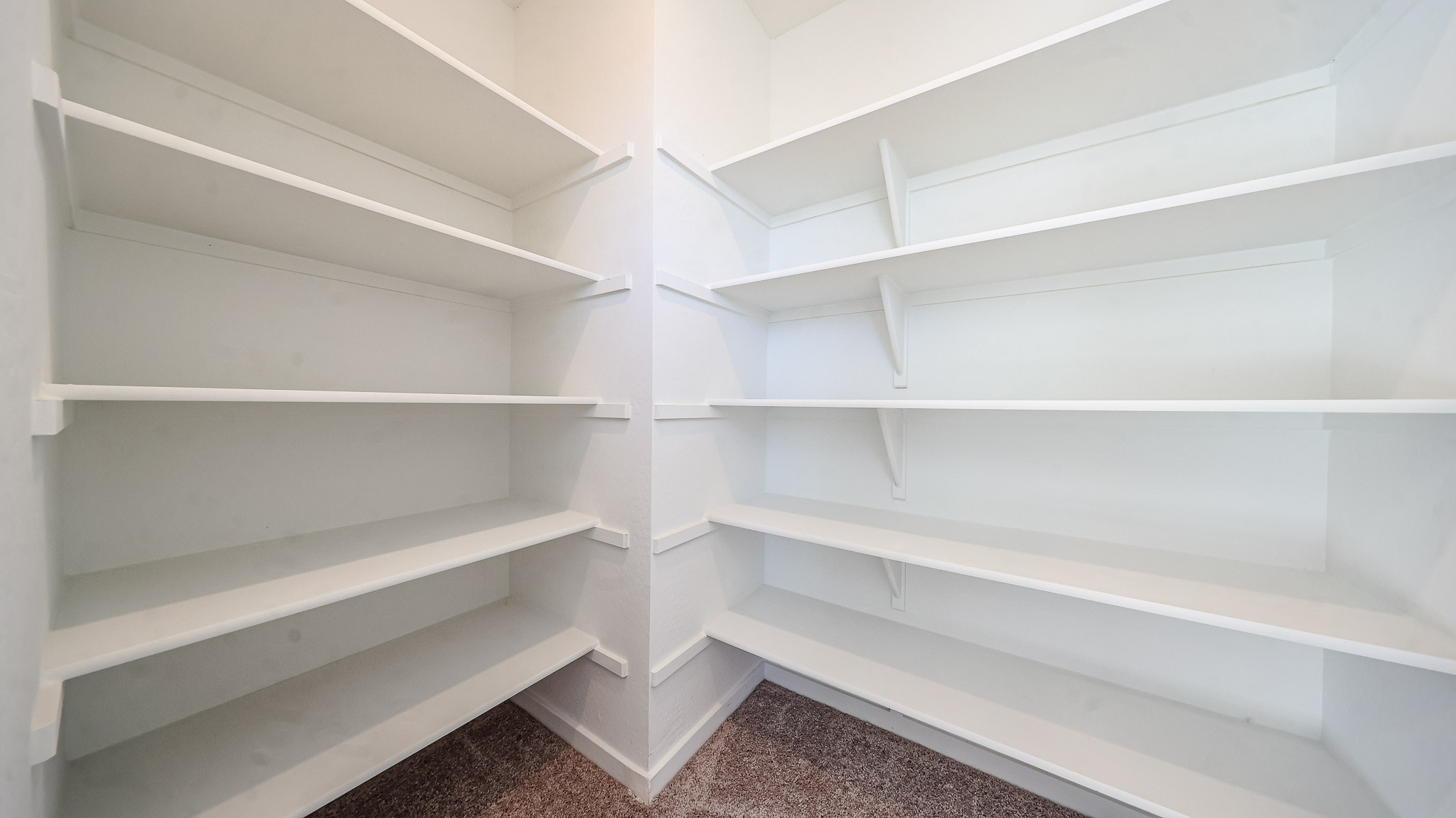 A white shelf with white shelves.
