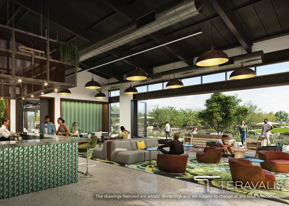 A group of people sitting at tables.