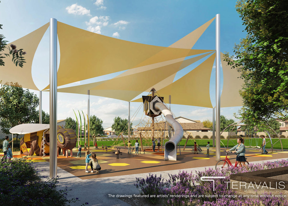 A large sculpture of a person on a horse in a park.