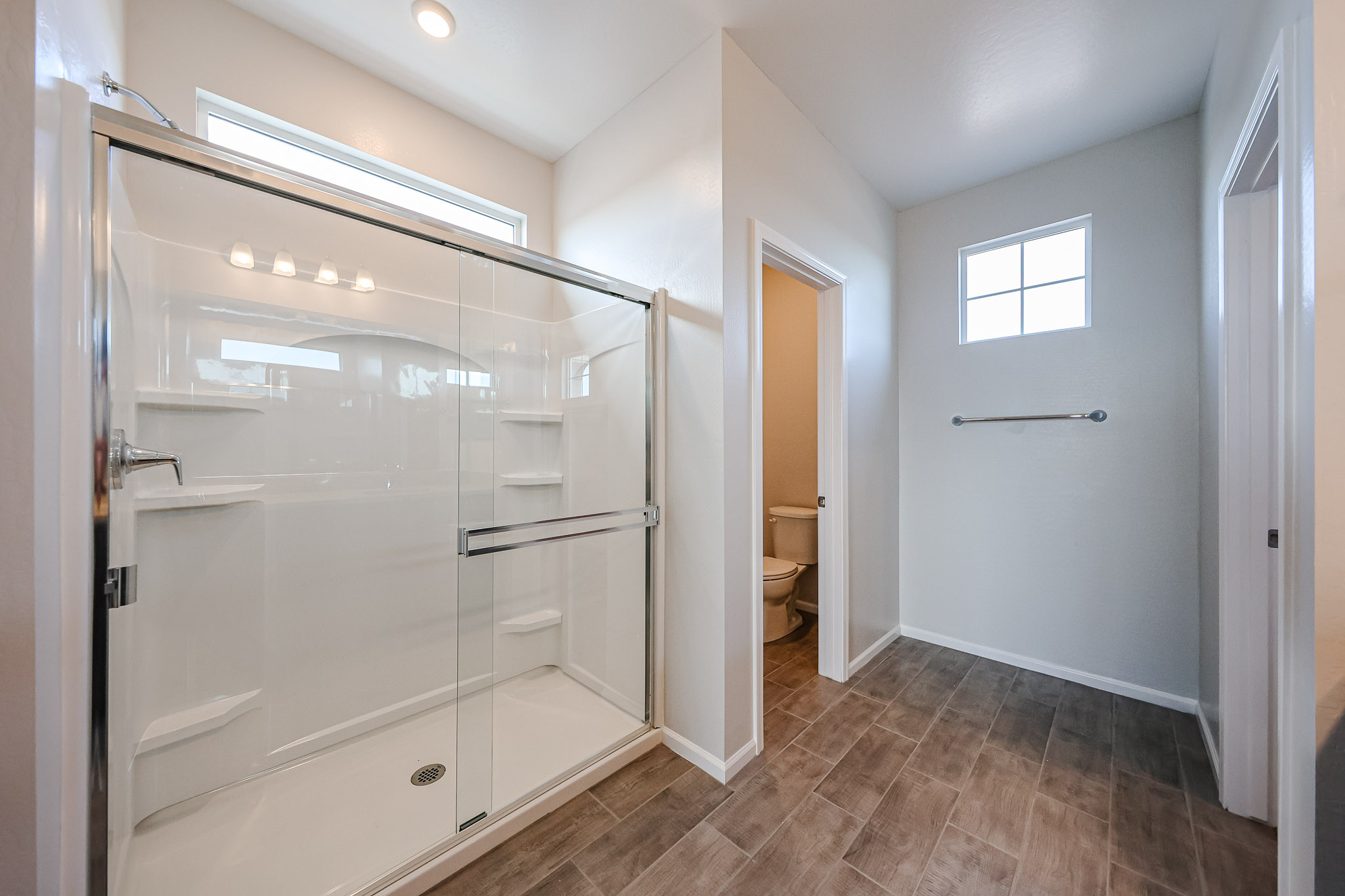 A bathroom with a glass shower.