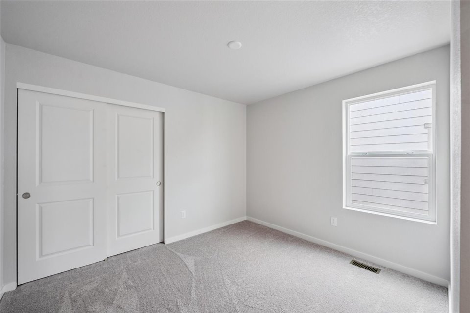 A room with white doors.
