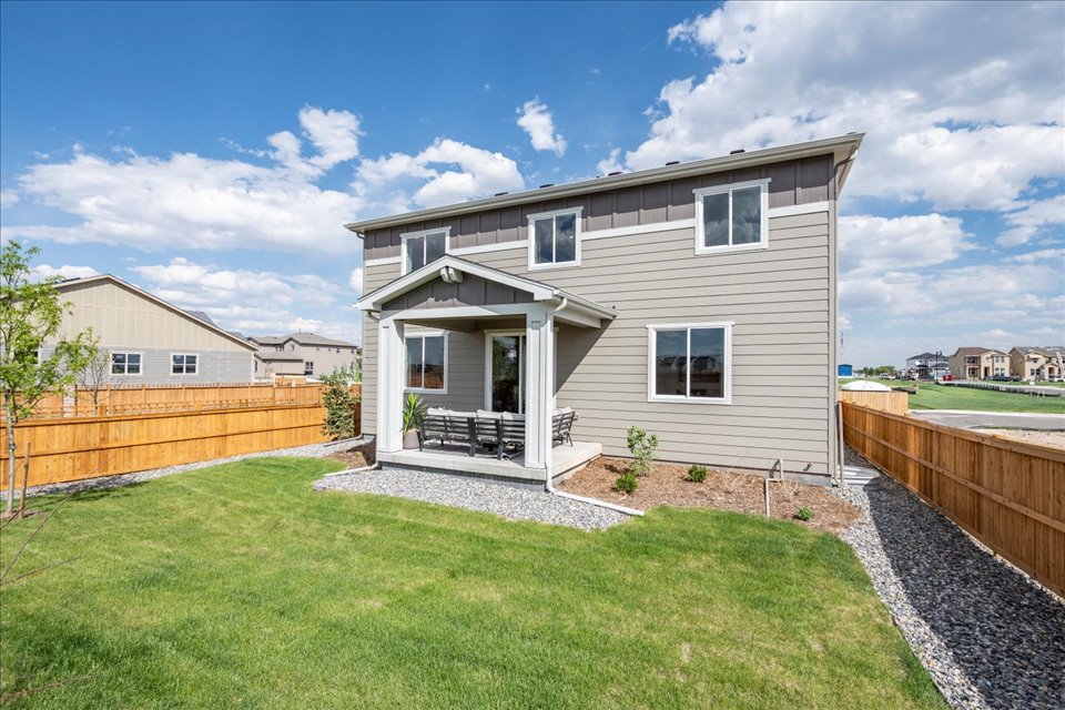 A house with a fence around it.