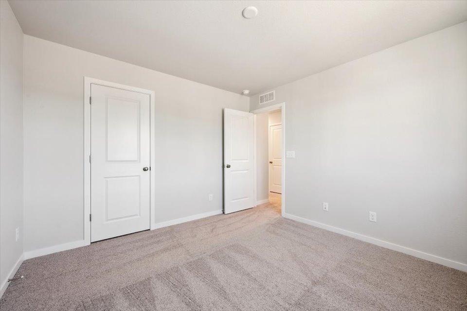 A room with white doors.