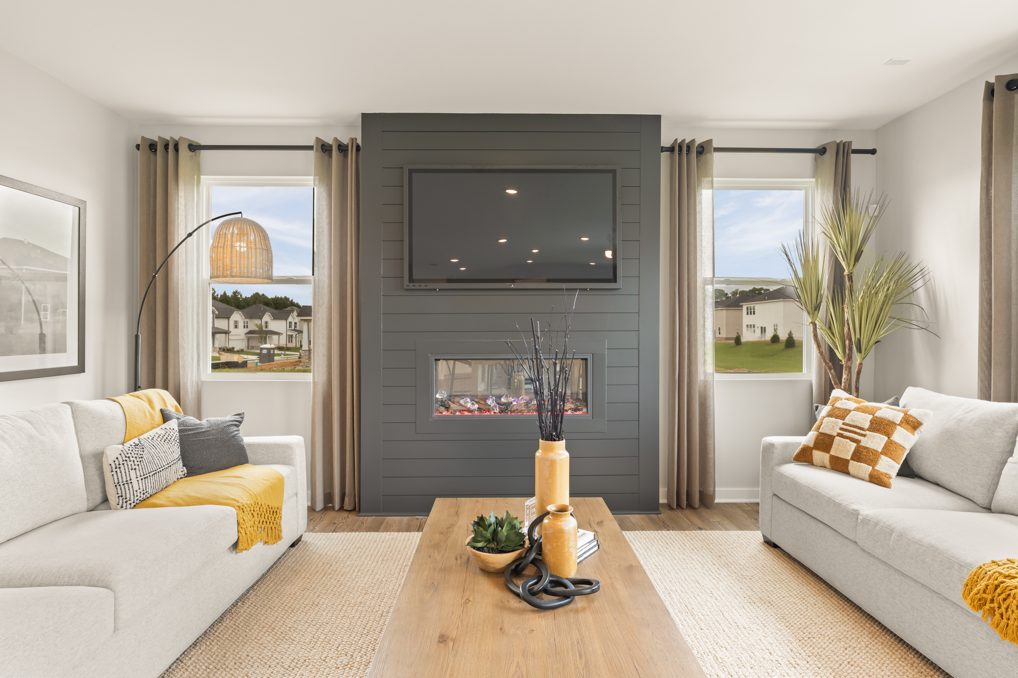 A living room with a fireplace.