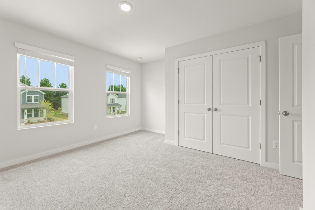 A room with white doors.