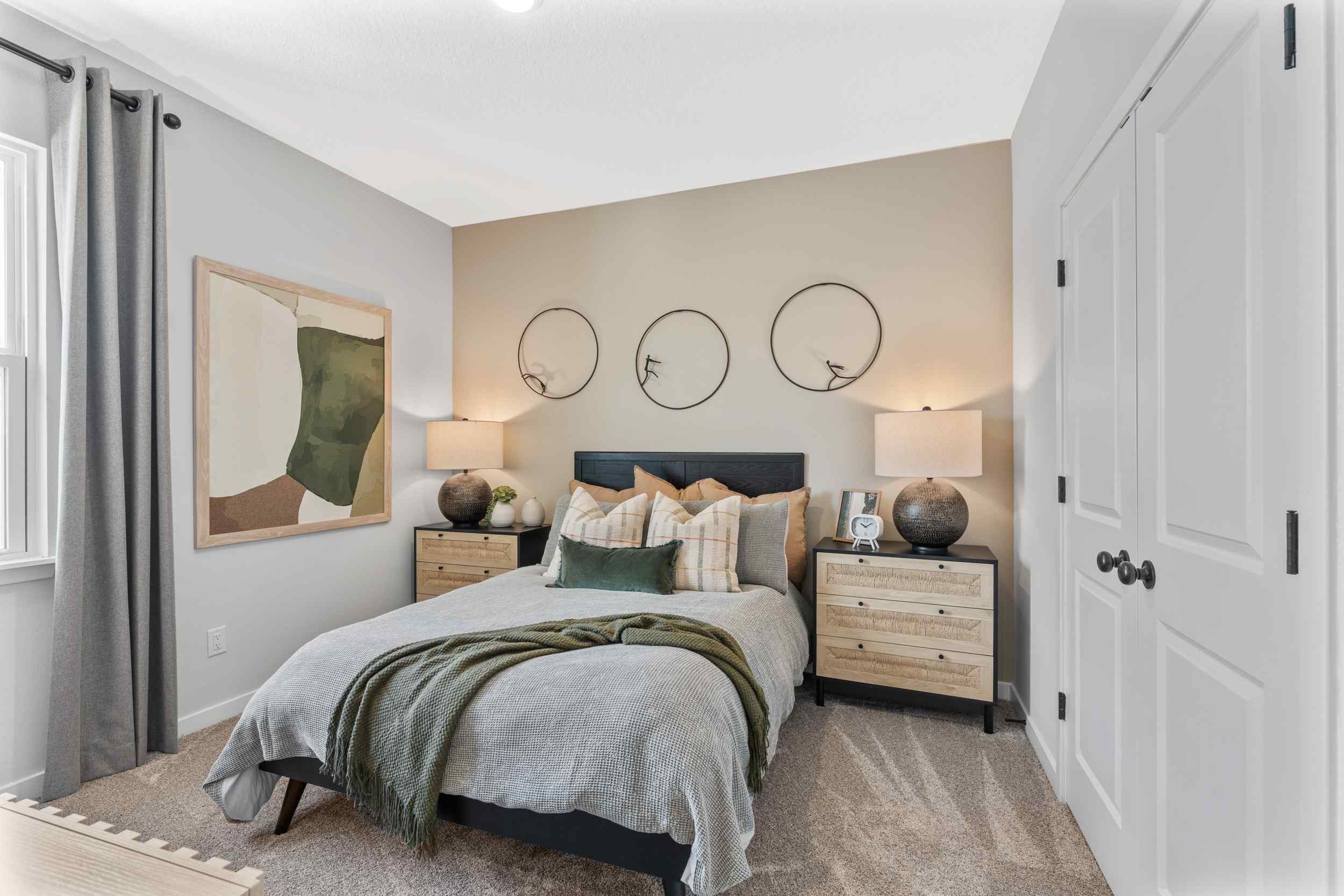 Silverbell II Model Home Guest Room with Bed and Nighstands at Camden Woods in Kingsland, GA