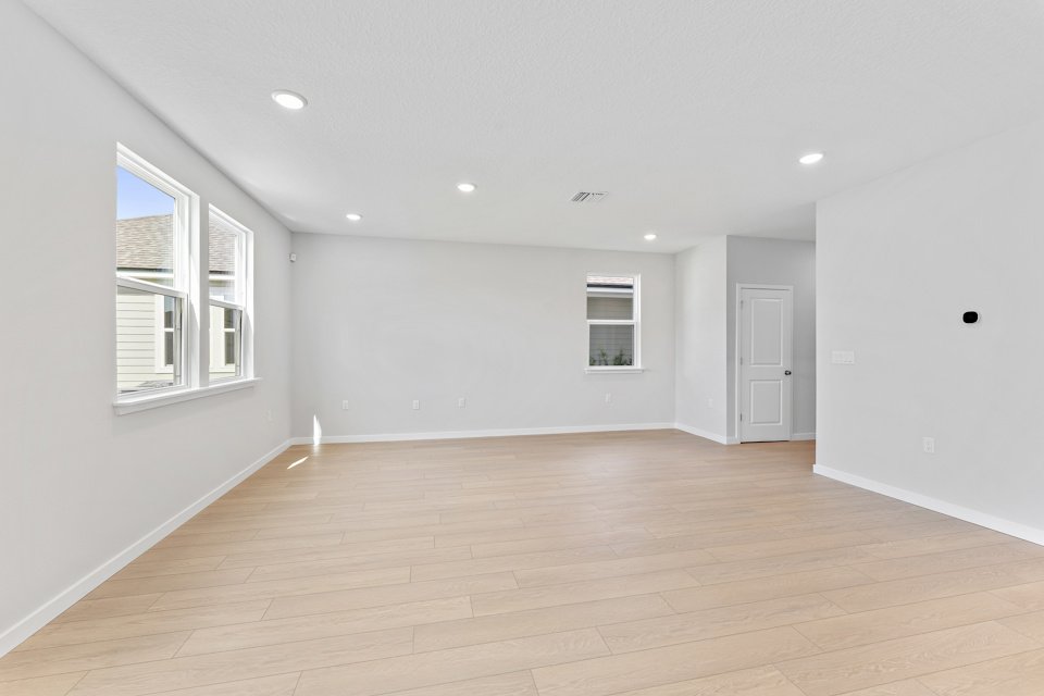 Lot 20 Ponderosa II Dining Area Overlooking Living Room at Camden Woods in Kingsland, GA