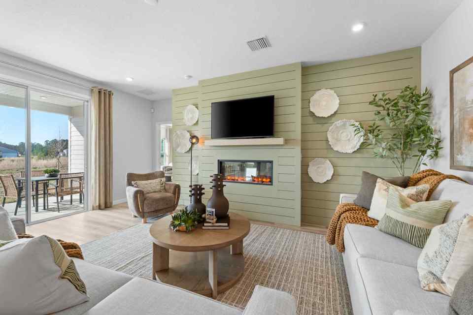 A living room with a fireplace.