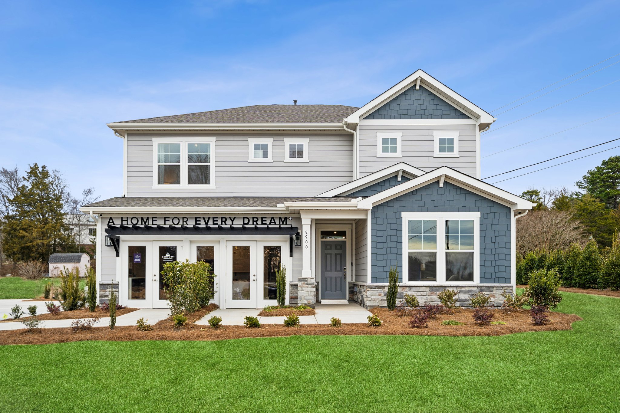 A house with a sign on the front.