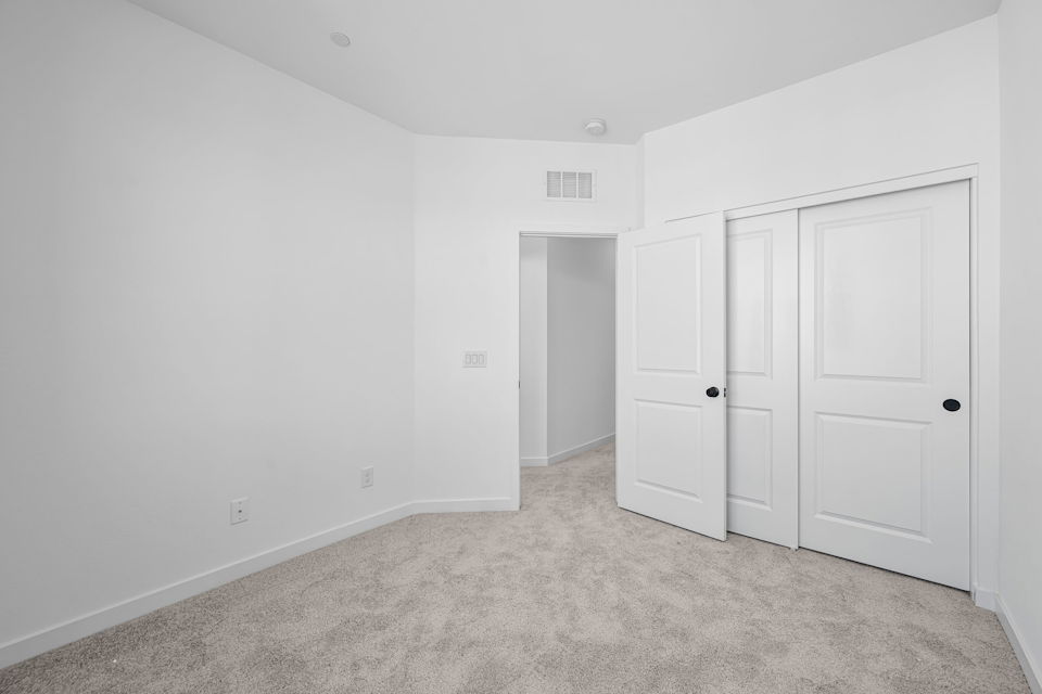 A room with white doors.
