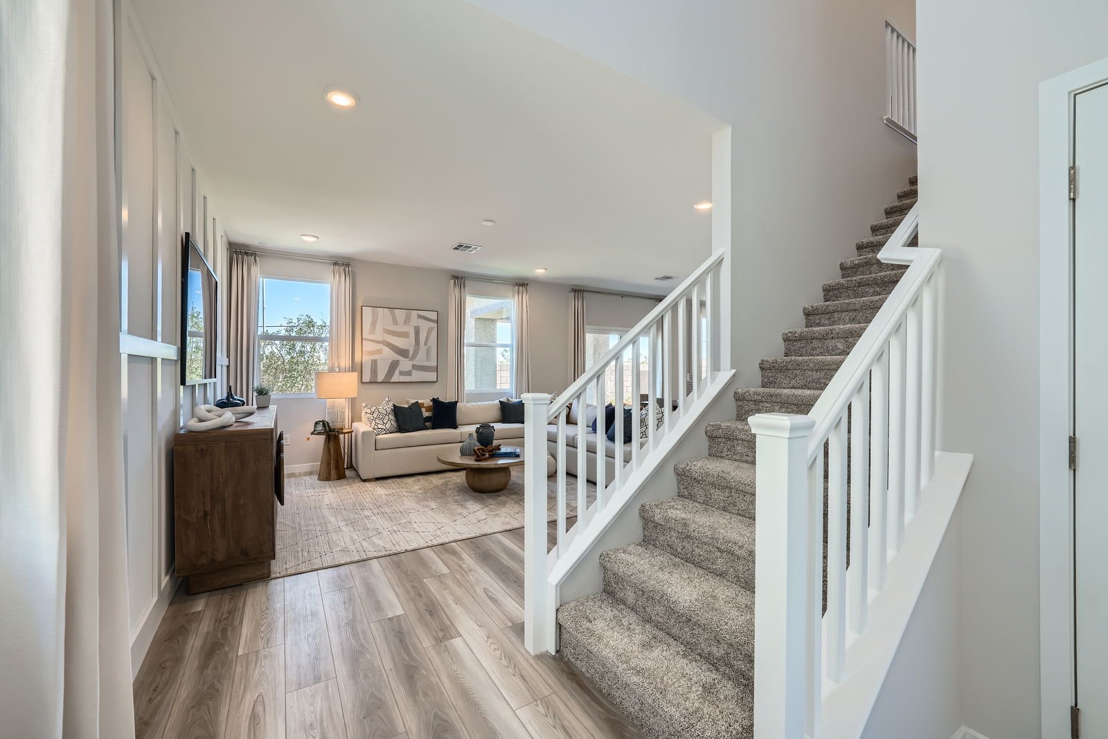 A large white staircase in a house.