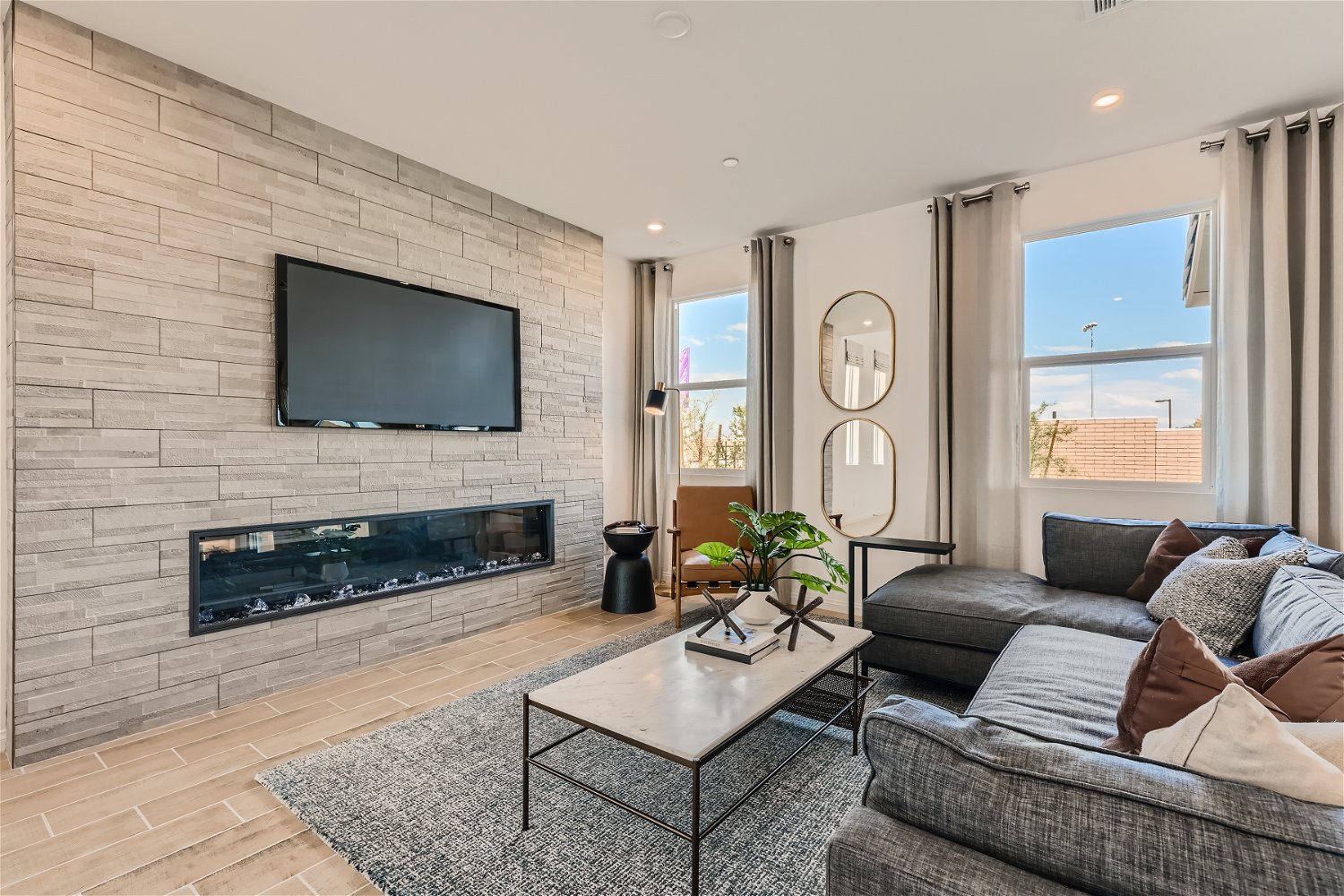 A living room with a fireplace.