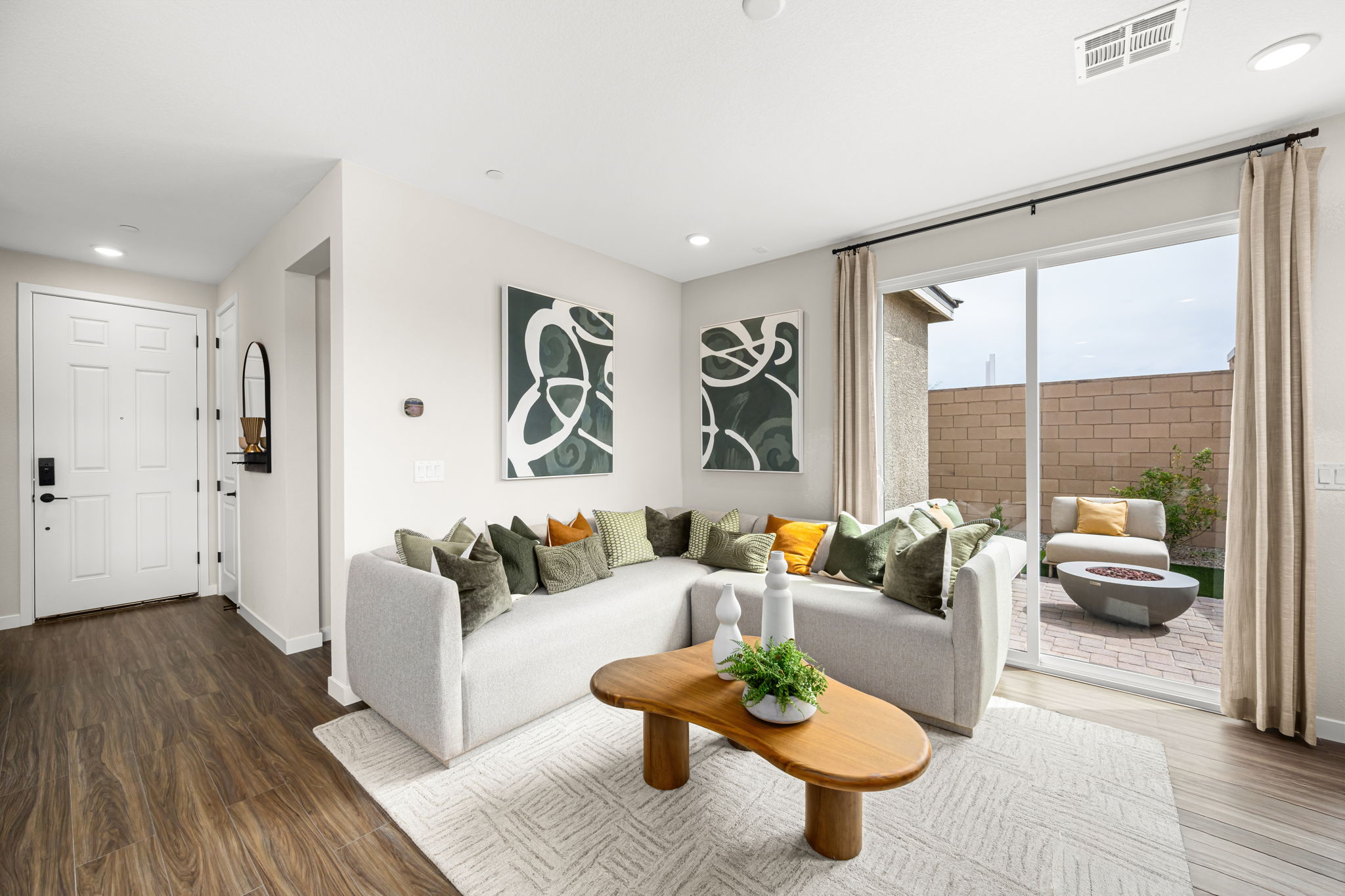A living room with a couch and coffee table.