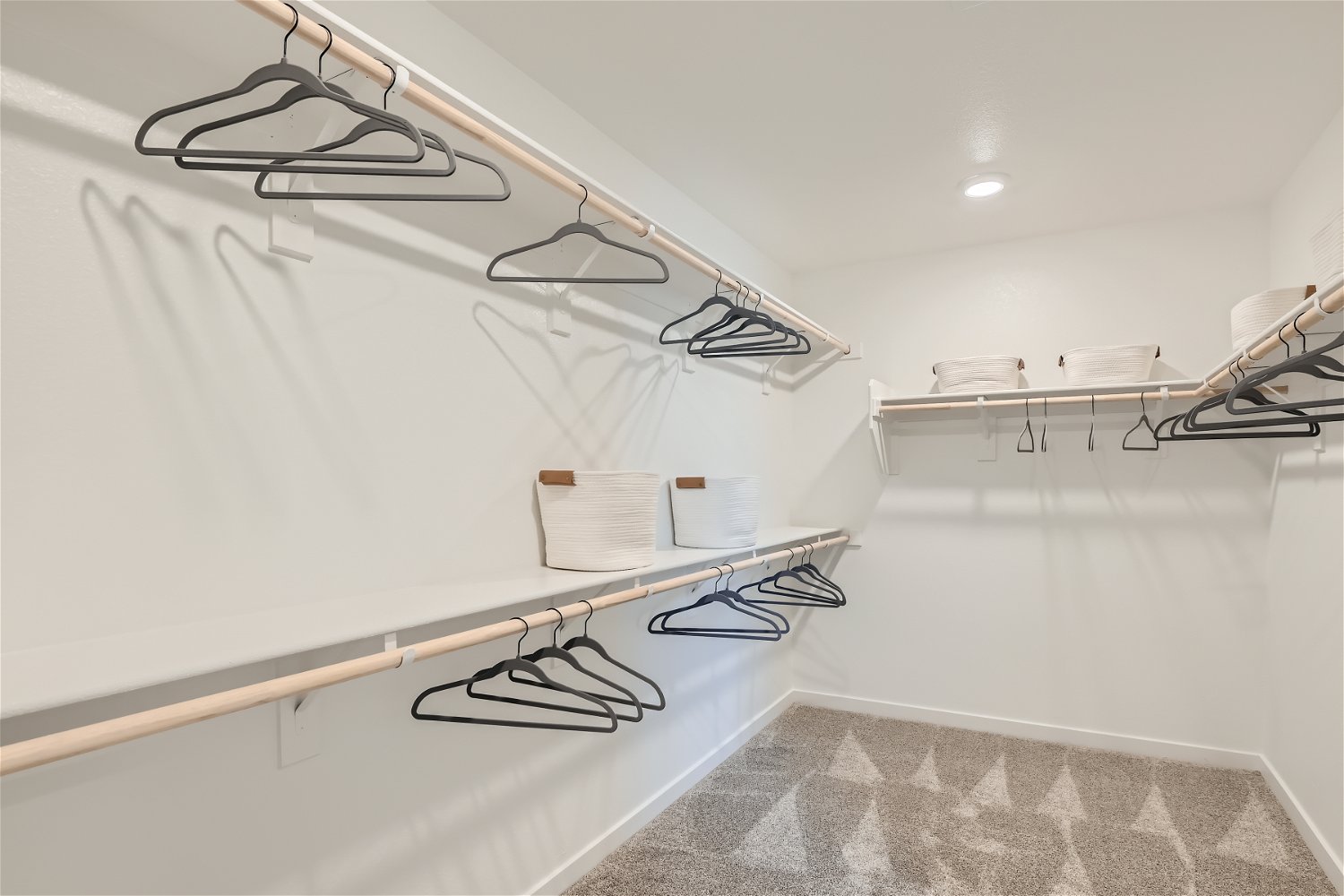 A room with a bed and a chair.