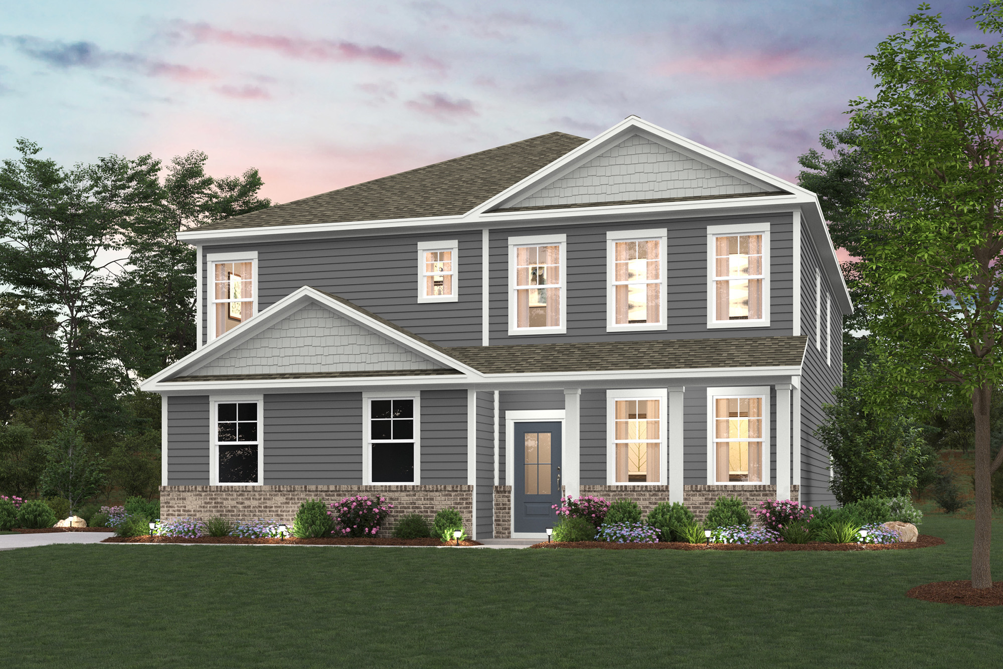 A house with a lawn in front of it.