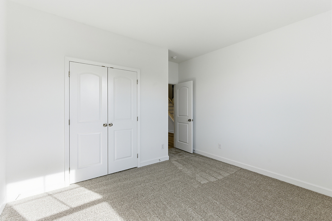 A room with white doors.