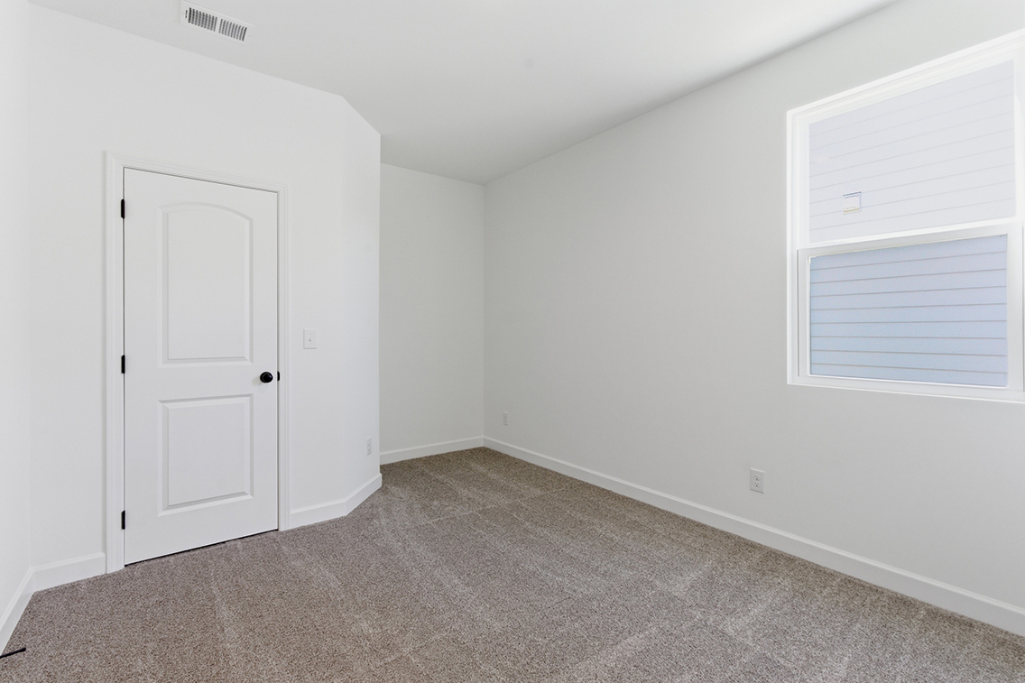 A room with white doors.