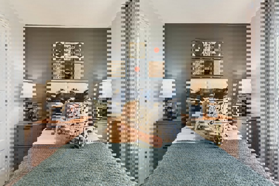 A bed with a pillow and pillows.