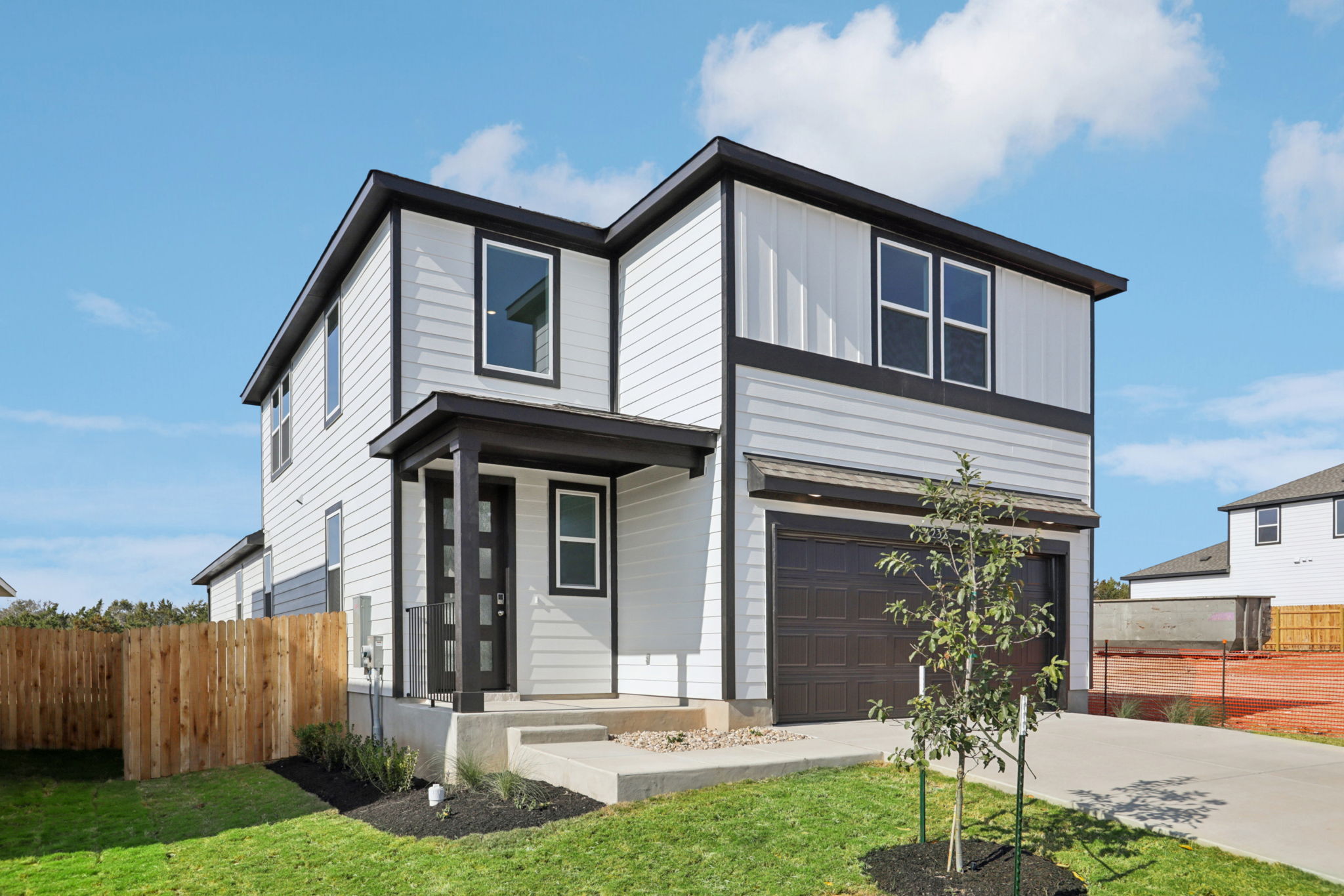 A house with a fence around it.