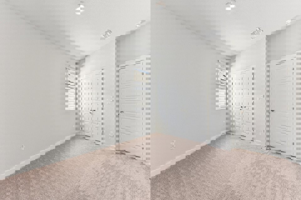 A room with white doors.