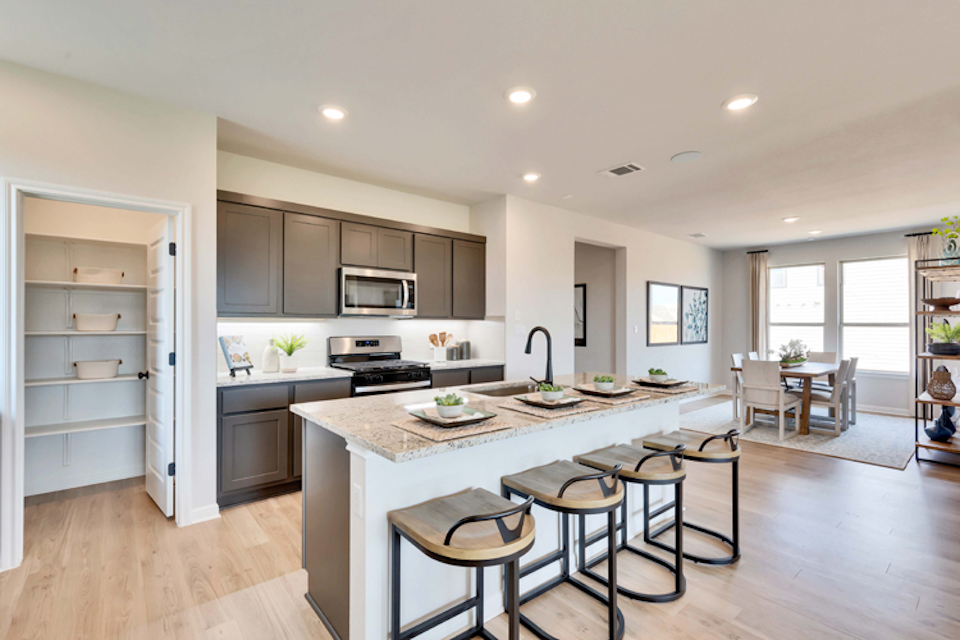 A kitchen with a large island.