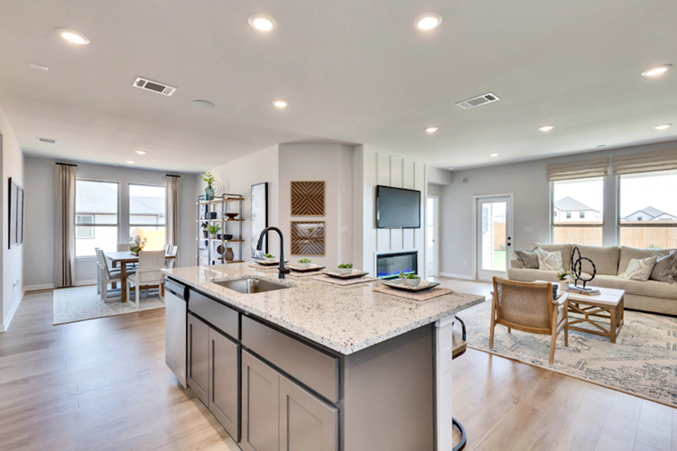 A kitchen with a large island.