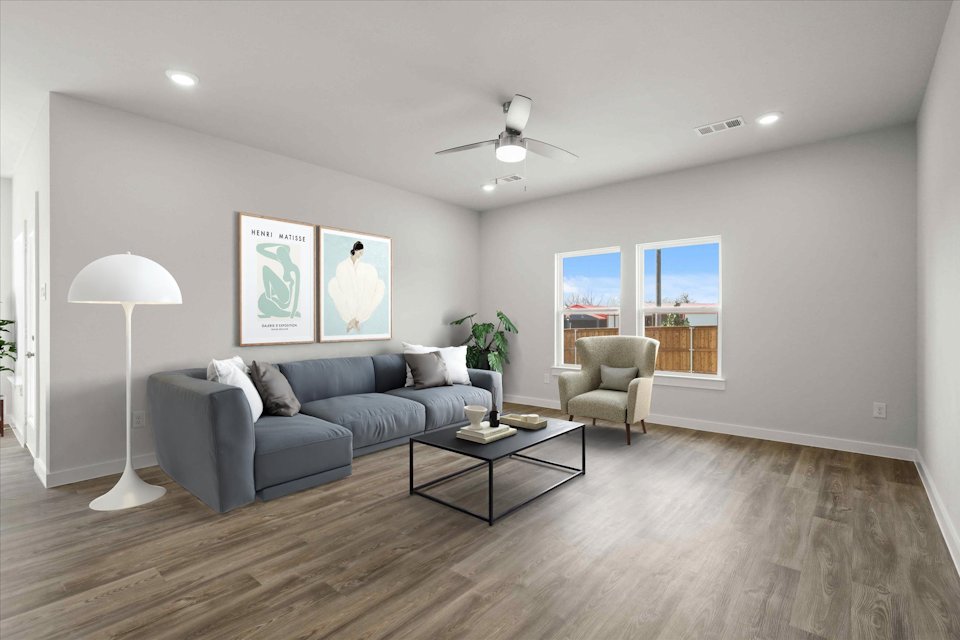 A living room with a couch and a coffee table.