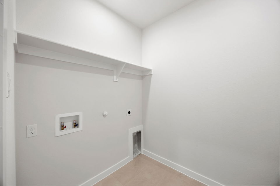 A white room with a white wall.