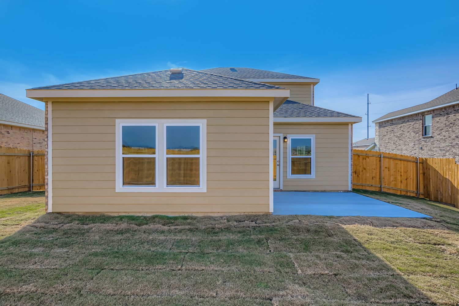 A house with a fence around it.