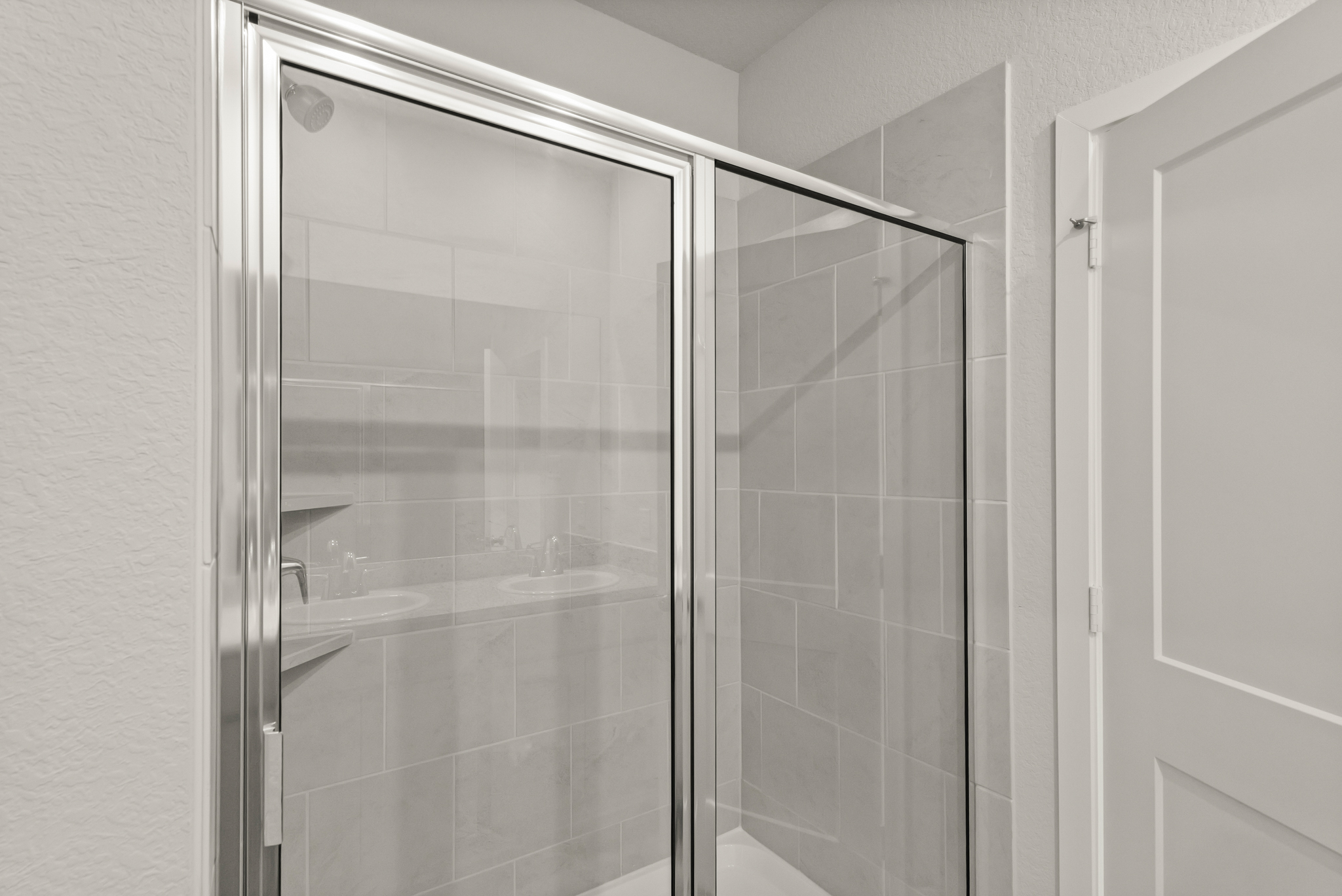 A shower unit in a bathroom.
