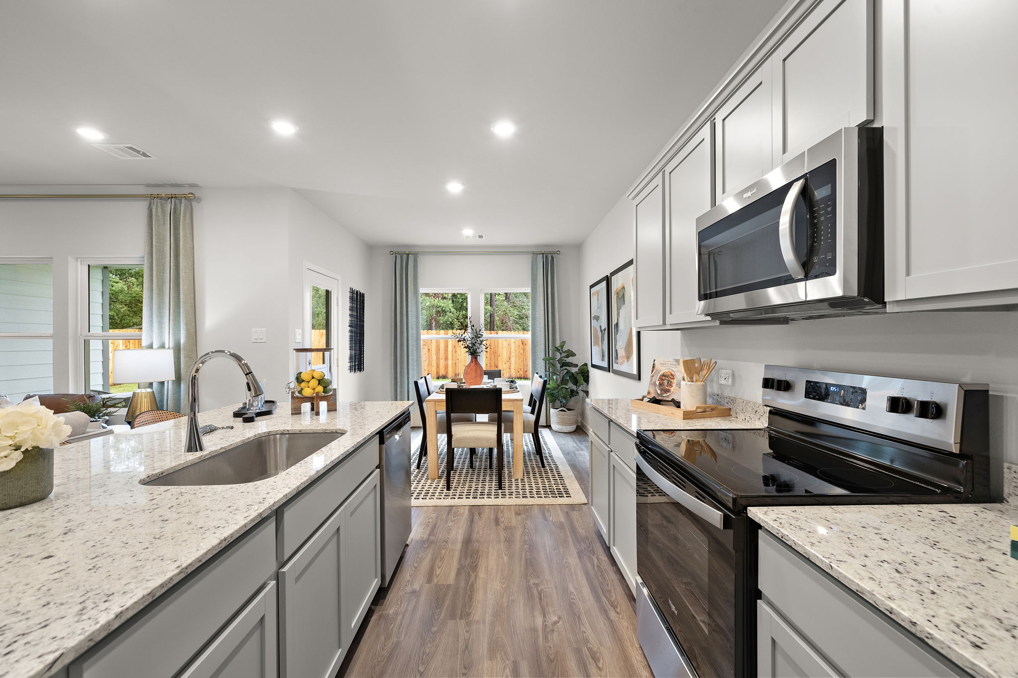 A kitchen with black appliances.