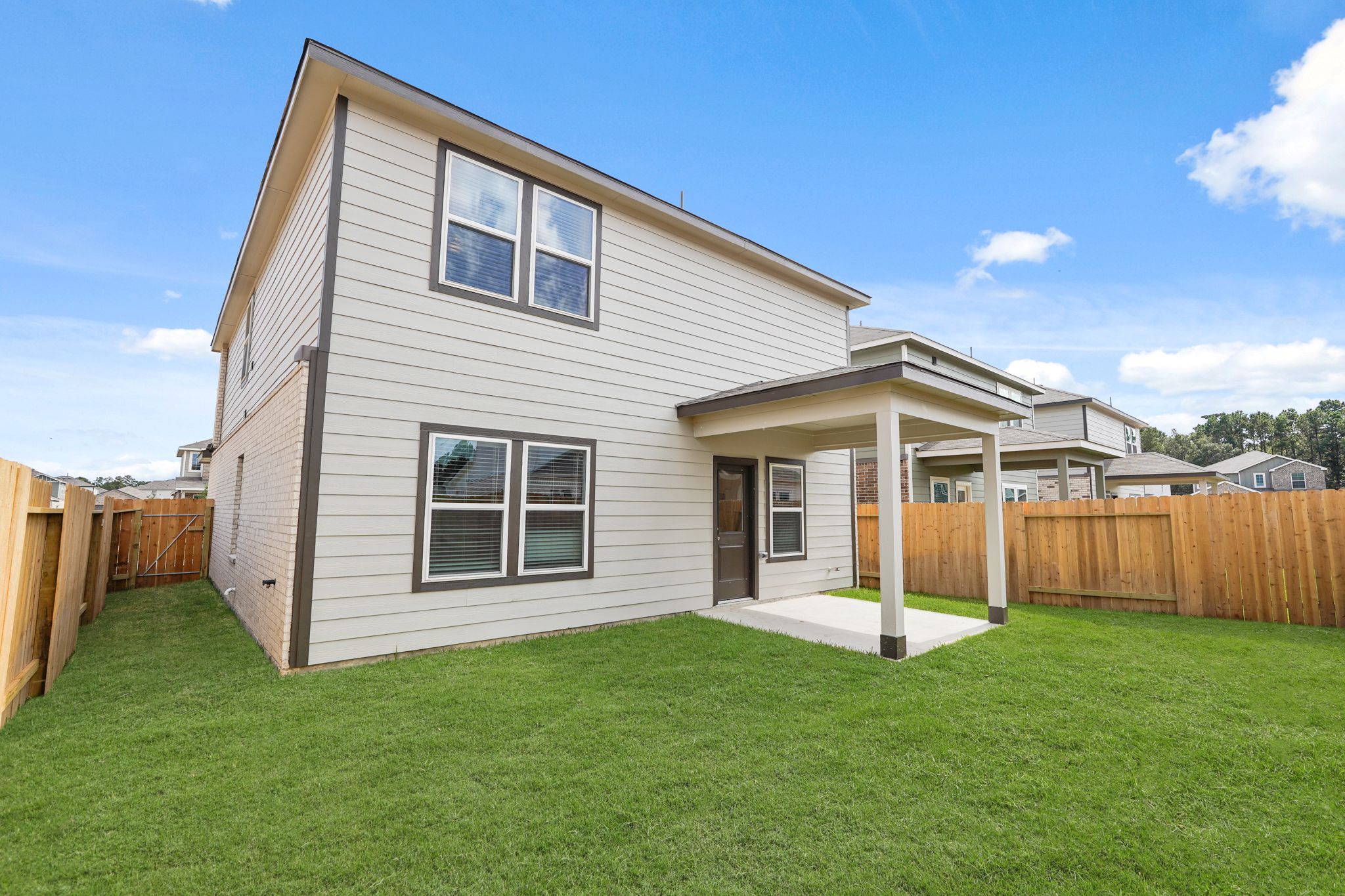 A house with a fence around it.