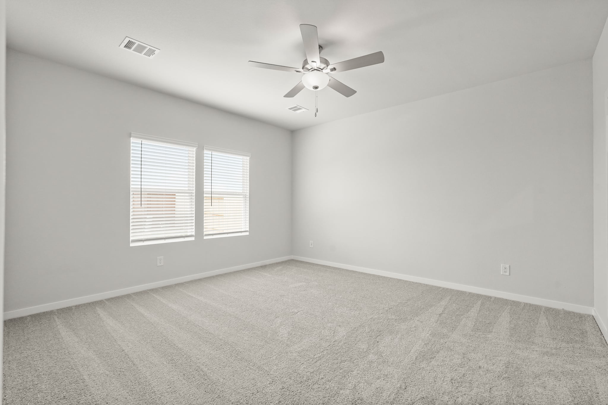A ceiling fan in a room.