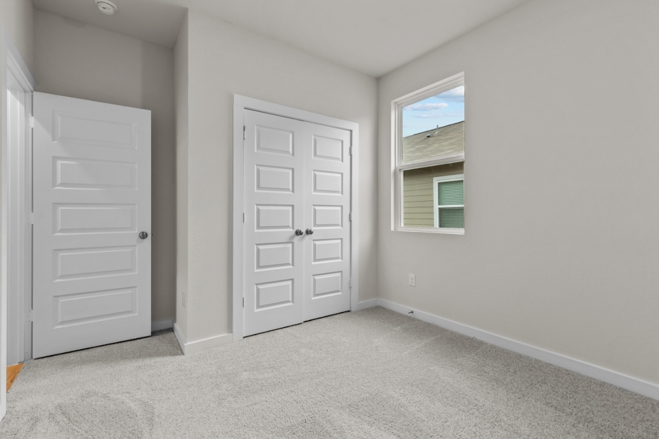A room with white doors.