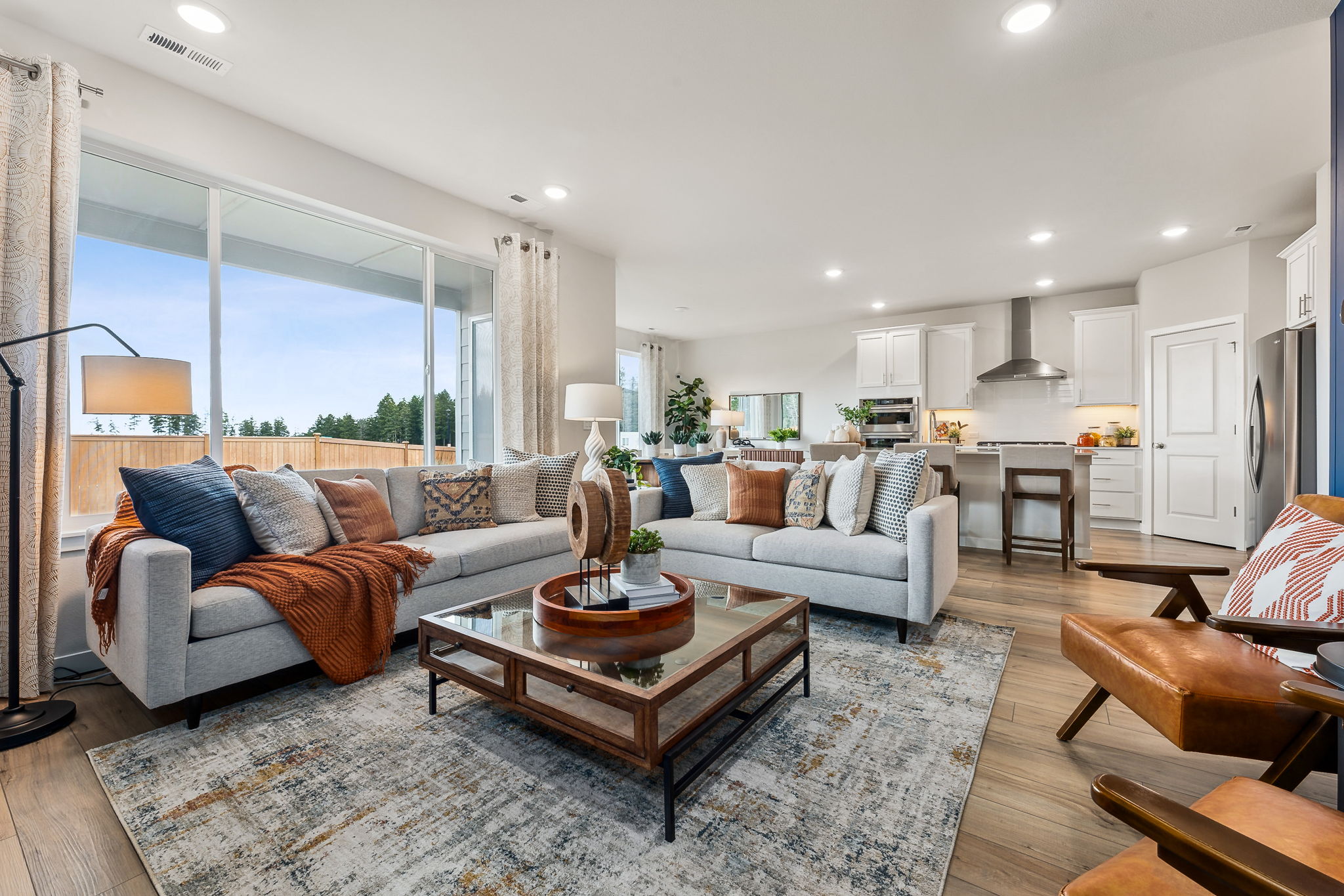A living room with a large window.