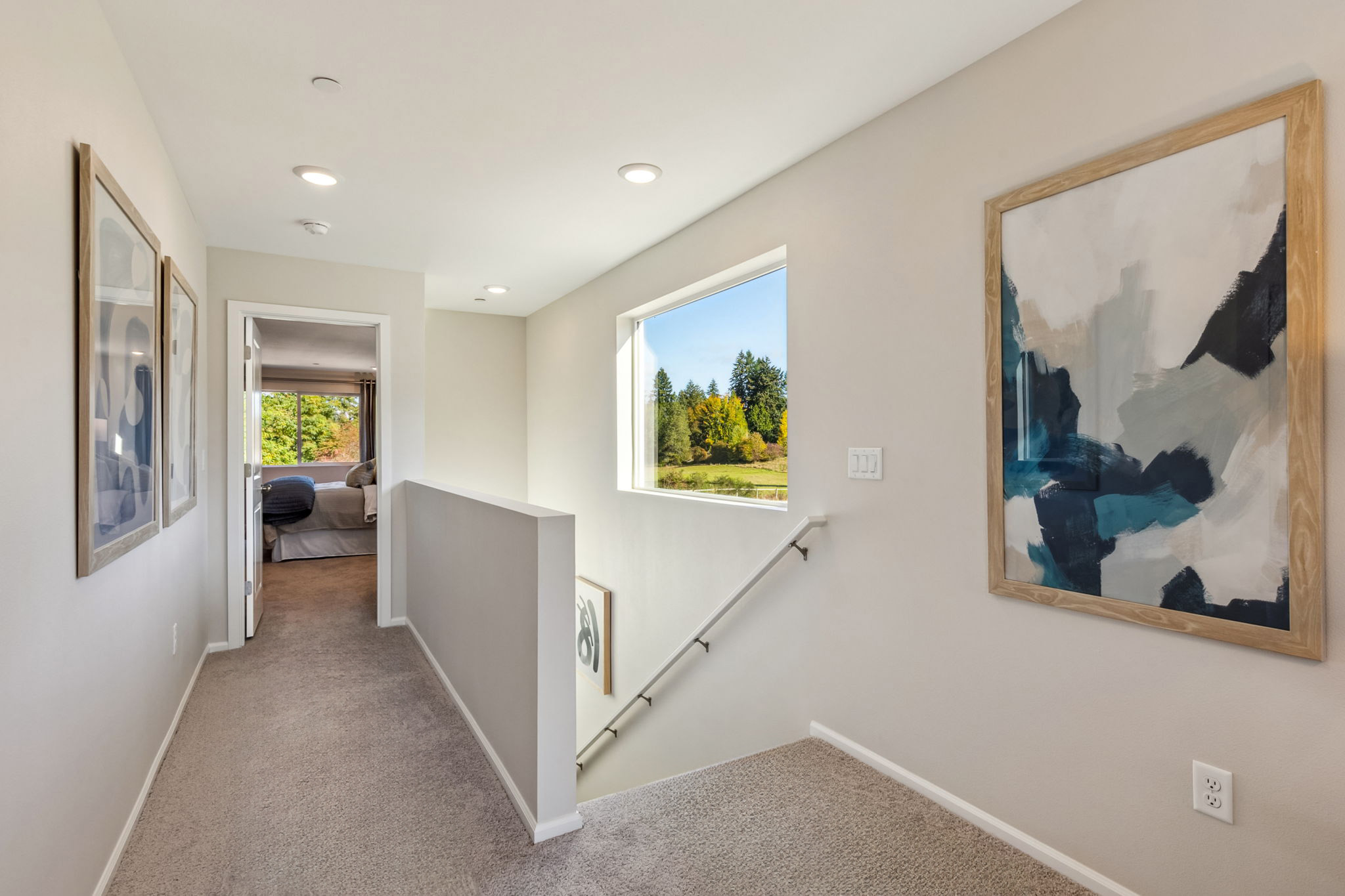 A room with art on the wall.