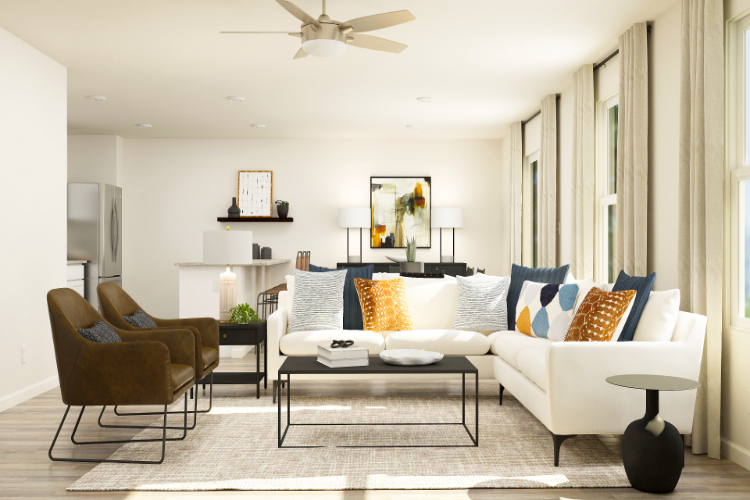 A living room with a white couch and a table.