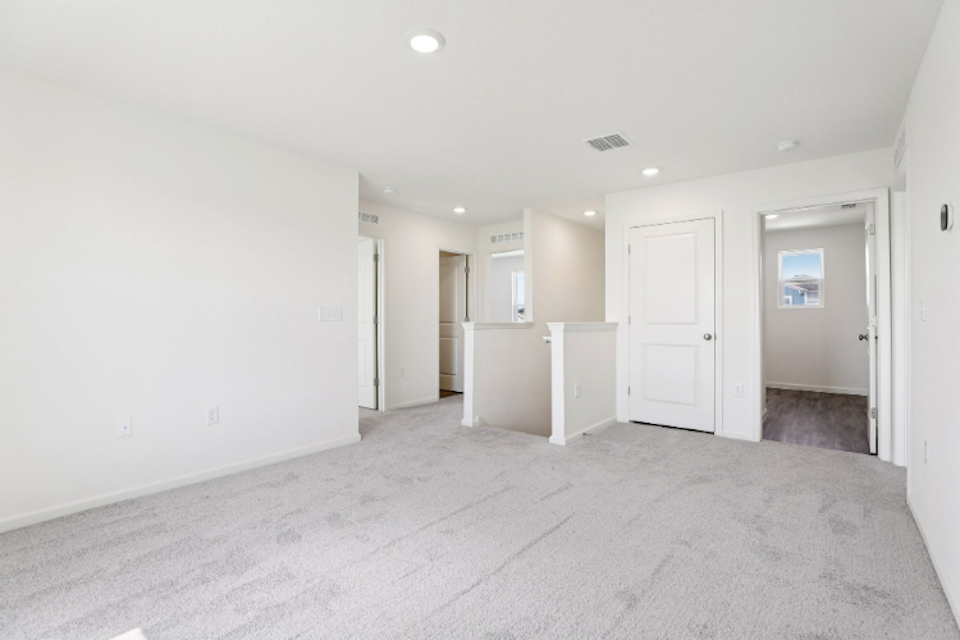 A room with white doors.