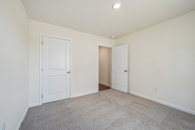 A room with white doors.