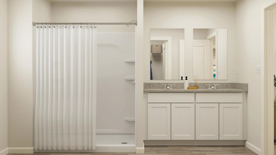 A bathroom with a shower curtain.