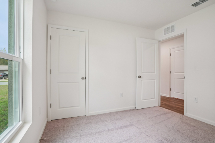 A room with white doors.
