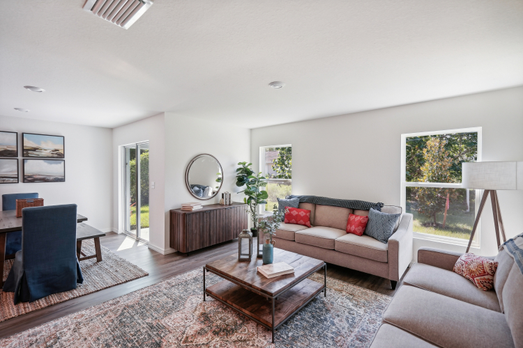 A living room with a couch and a coffee table.