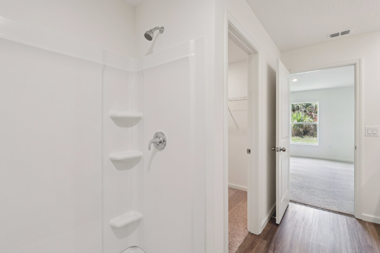 A bathroom with a toilet and sink.